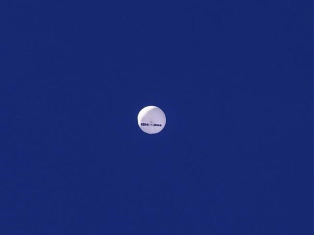 A large balloon drifts above the Atlantic Ocean, just off the coast of South Carolina near Myrtle Beach, Saturday, Feb. 4, 2023. Minutes later, the balloon was struck by a missile from an F-22 fighter jet, ending its weeklong traverse over the U.S. China said the balloon was a weather …