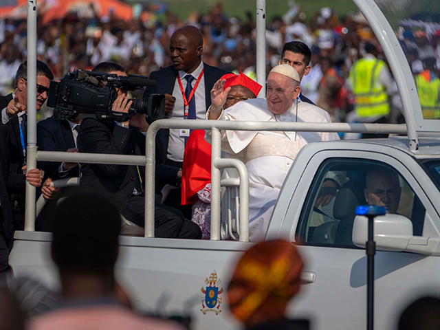 Pope Francis arrives at Ndolo airport to celebrate Holy Mass in Kinshasa, Congo, Wednesday Feb. 1, 2023. Local climate activists in Congo are hoping Pope Francis' visit will help spur action to protect the country's rainforest from oil and gas interests. (AP Photo/Jerome Delay)