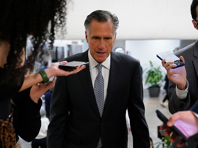 Sen. Mitt Romney, R-Utah, speaks with members of the press Nov. 16, 2022, on Capitol Hill