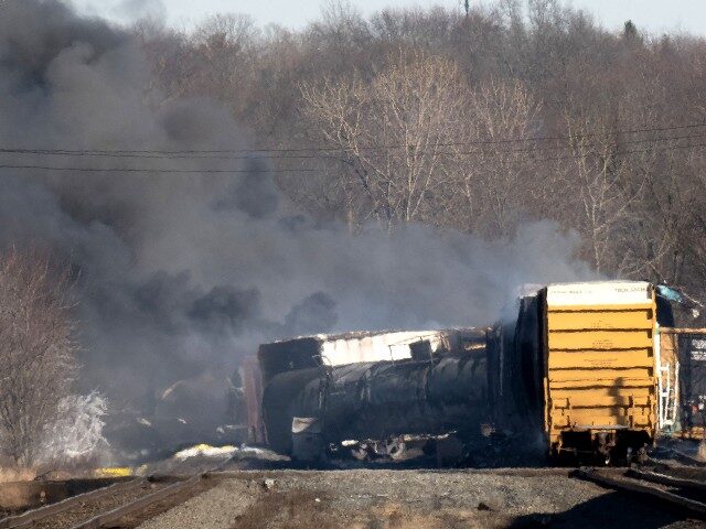 Smoke rises from a derailed cargo train in East Palestine, Ohio, on February 4, 2023. - Th