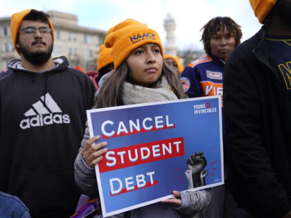 Student debt relief advocates gather outside the Supreme Court on Capitol Hill in Washington, Tuesday, Feb. 28, 2023.. Arguments at the Supreme Court over President Joe Biden's student debt cancellation left some borrowers feeling isolated as they heard such a personal subject reduced to cold legal language. (AP Photo/Patrick Semansky)