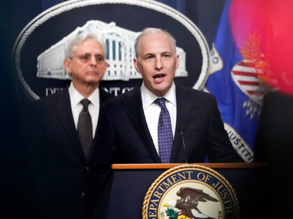 Justice Department's Assistant Attorney General for the National Security Division Matthew Olsenspeaks during a news conference at the Department of Justice in Washington, Jan. 27, 2023, as Attorney General Merrick Garlandlistens at left. The Biden administration officials urged Congress on Tuesday to renew a surveillance program that the U.S. government …