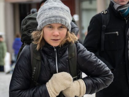Sweden's Greta Thunberg leaves after staging along with other young climate activists of t