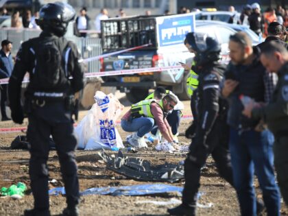 JERUSALEM - FEBRUARY 10 : Israeli officials inspect the scene after 2 Israelis killed, 5 i