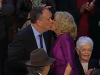 First Lady Jill Biden, Second Gentleman Doug Emhoff Kiss Ahead of Biden State of the Union