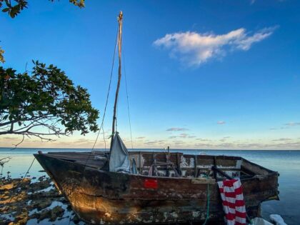 Homemade boats used by Cuban migrants to reach the United States sit off shore at Harry Ha