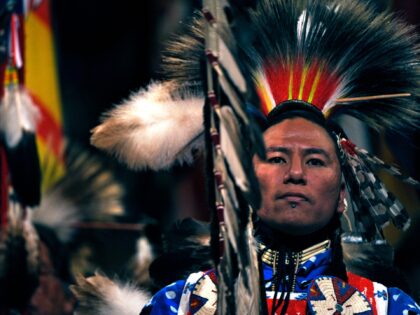 Nathan Chasing Horse of Rosebud, South Dakota, and a member of the Sioux Tribe, leads the Color guard at the beginning of the grand entry into the coliseum. The 37th annual Denver March Pow Wow finished up today, March 20th, 2011 at the Denver Coliseum with Grand Entry ceremony of …