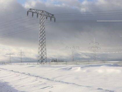 Power outage PRODUCTION - 30 January 2023, Saxony-Anhalt, Hüttenrode: Power pylons are lo