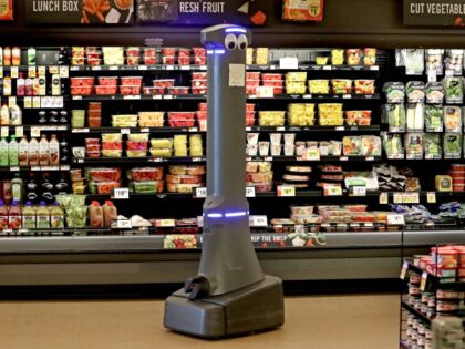 QUINCY, MA - MAY 17: Marty, a robot on duty, patrols an aisle at Stop & Shop in Quincy, MA on May 17, 2019. Marty is 140 pounds of plastic and metal, with glowing lights atop a towering frame with big cartoon eyes, and cameras and lasers to spot garbage, …