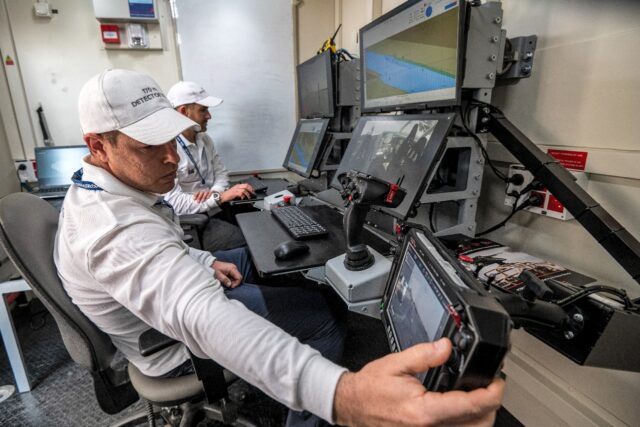 Controllers man a terminal at the command station of the Israel Aerospace Industries in an