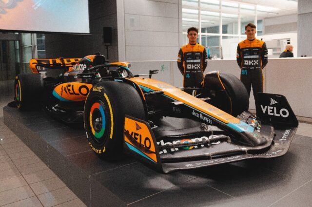 Lando Norris (left) and Oscar Piastri with the new McLaren MCL60 car they will drive for t