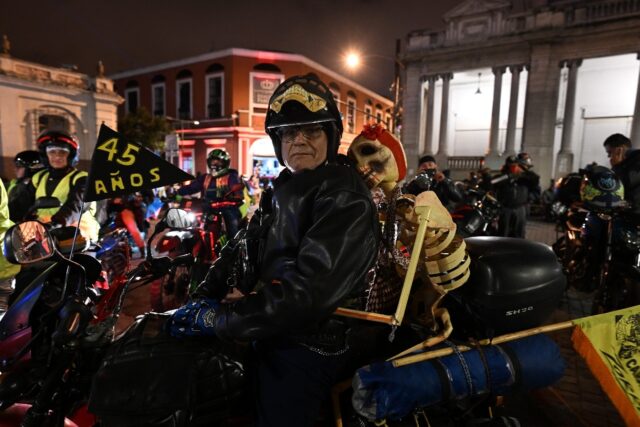 Motorcyclists take part in the 'Caravan of Zorro' pilgrimage in Guatemala on February 4, 2