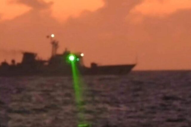 The Philippine Coast Guard accused a Chinese vessel of shining a "military-grade laser lig