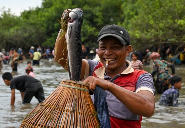 Cambodians celebrate traditional fishing methods at annual ceremony ...