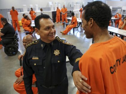 Harris County Sheriff Ed Gonzalez visits inmates in the county jail. The jail recently failed a state standards inspection. (Godofredo A Vasquez/Houston Chronicle via AP)