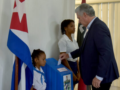 Cuban President Miguel Díaz-Canel votes at a polling station during the first round of the municipal elections in Havana, Cuba, Sunday, Nov. 27, 2022. (Omara Garcia Mederos/Pool Photo via AP)