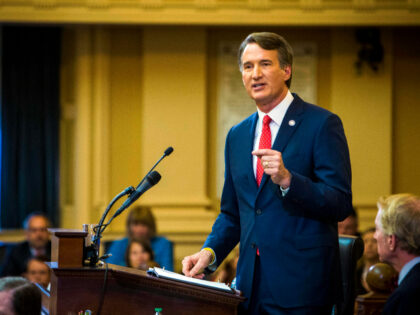 FILE - Virginia Gov. Glenn Youngkin delivers his State of the Commonwealth address to a joint session of the Virginia legislature in the House chamber in Richmond, Va., Jan. 11, 2023. Amazon Web Services plans to invest $35 billion in new data centers in Virginia under a deal with the …