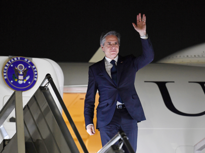 U.S. Secretary of State Antony Blinken disembarks from his plane upon his arrival at the a