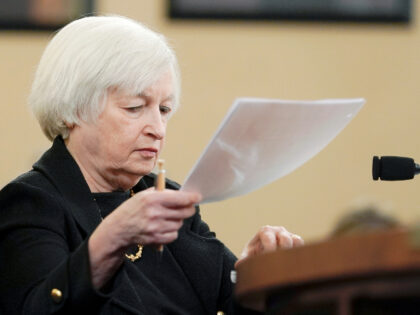Treasury Secretary Janet Yellen looks at papers as she testifies during a House Ways and Means committee hearing on President Joe Biden's fiscal year 2024 budget request, Friday, March 10, 2023, on Capitol Hill in Washington. (AP Photo/Mariam Zuhaib)
