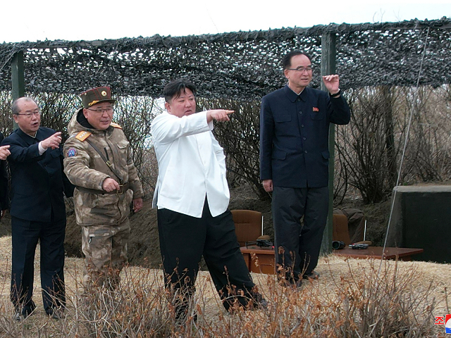 In this photo provided by the North Korean government, North Korean leader Kim Jong Un, second right, supervises what it says a test launch of a Hwasal strategic cruise missile during an exercise in North Korea Wednesday, March 22, 2023. Independent journalists were not given access to cover the event depicted in this image distributed by the North Korean government. The content of this image is as provided and cannot be independently verified. Korean language watermark on image as provided by source reads: "KCNA" which is the abbreviation for Korean Central News Agency. (Korean Central News Agency/Korea News Service via AP)