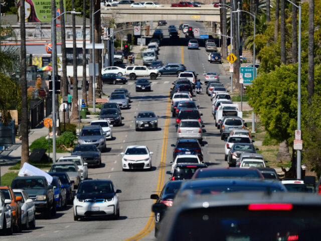 A backed up line of traffic winds it's way along a street near downtown Los Angeles o
