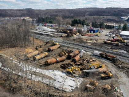 A view of the scene Friday, Feb. 24, 2023, as the cleanup continues at the site of of a Norfolk Southern freight train derailment that happened on Feb. 3 in East Palestine, Ohio. (AP Photo/Matt Freed)
