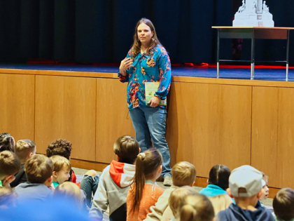 Laura Perry Smalts, read aloud Brave Books' Elephants Are Not Birds to a crowd of 500 parents, grandparents, and children at the Fayetteville Public Library. (Brave Books)