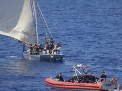 Coast Guard crews interdict a sailing vessel overloaded with 145 Haitian migrants. (U.S. Coast Guard -- 7th District)