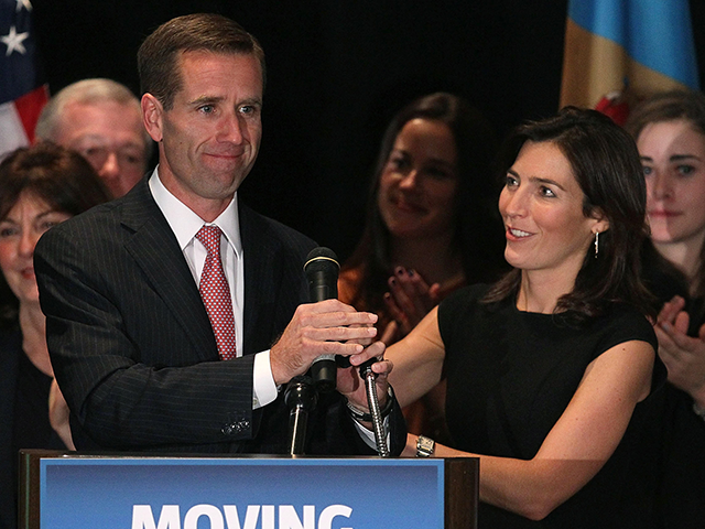 Attorney General Beau Biden (L) celebrates his win with his wife Hallie Biden during a victory party for Democrats on November 2, 2010 in Wilmington, Delaware. Biden won in his re-election bid for Delaware Attorney General against Independent candidate Doug Campbell. (Photo by Mark Wilson/Getty Images)