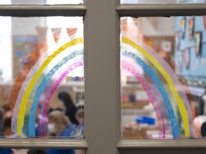 CARDIFF, WALES - FEBRUARY 23: A rainbow painted on a classroom door at Roath Park Primary School on February 23, 2021 in Cardiff, Wales. Children aged three to seven began a phased return to school on Monday. Wales' education minister Kirsty Williams has said more primary school children will be …