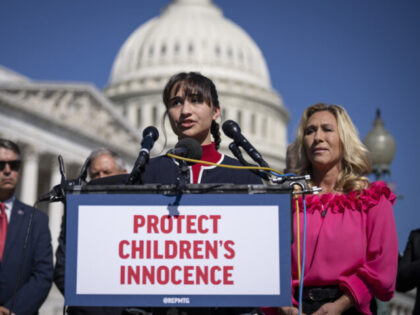 WASHINGTON, DC - SEPTEMBER 20: Chloe Cole speaks as Rep. Marjorie Taylor Greene (R-GA) looks on during a news conference on Capitol Hill September 20, 2022 in Washington, DC. Greene discussed her legislation named the Protect Childrens Innocence Act, which would prohibit gender-affirming healthcare to transgender people under the age …