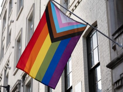 Pride Progress flag in Soho on 16th November 2022 in London, United Kingdom. The flag includes the rainbow flag stripes to represent LGBTQ+ communities, with colors from the Transgender Pride Flag and to also represent people of colour. (photo by Mike Kemp/In Pictures via Getty Images)