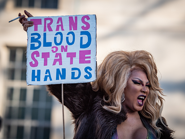 A protestor holds a placard during the Trans Rights Protest. Protests took place in London following the UK Governments blocking of the gender recognition reform which was passed in December 2022. (Photo by Loredana Sangiuliano/SOPA Images/LightRocket via Getty Images)