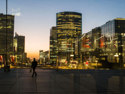 Office buildings illuminated in the La Defense business district of Paris, France, on Monday, Feb. 6, 2023. The French economy faces increasing food costs, raising energy price caps, higher interest rates and now widespread strikes which could further test the economy's resilience in a rough start to 2023. Photographer: Nathan …