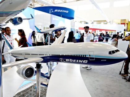 A model of Boeing Co. 777 at the company's booth during the Aero India 2023 at Air Force Station Yelahanka in Bengaluru, India, on Tuesday, February 14, 2023. Indian Prime Minister Narendra Modi repeated at the opening of the five-day Aero India show his government’s promise of boosting defense exports by more than 200% …