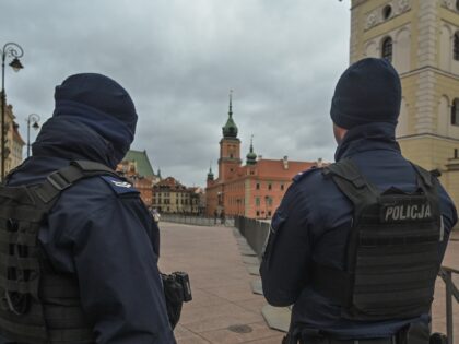 WARSAW, POLAND - FEBRUARY 21: Police officers securing Krakowskie Przedmiescie Street, where the US President will arrive for a speech at the Royal Castle, in Warsaw, Poland on February 21, 2023. President Biden is visiting Warsaw for the second time in less than a year, following a surprise visit to …