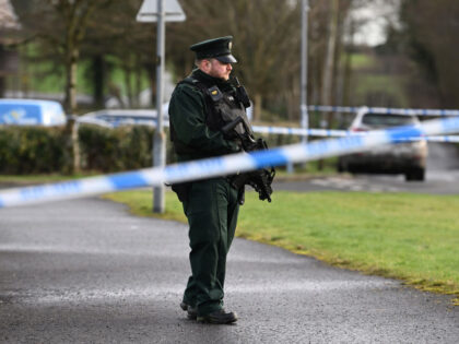OMAGH, NORTHERN IRELAND - FEBRUARY 23: Police and forensics are seen at the scene of last nights shooting of a high profile PSNI officer at the Youth Sports Centre on February 23, 2023 in Omagh, Northern Ireland. The senior police officer, named as Detective Chief Inspector John Caldwell was shot …