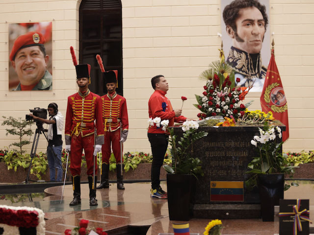 CARACAS, VENEZUELA - MARCH 5: Visitors pay their respects at the tomb of the late Venezuel