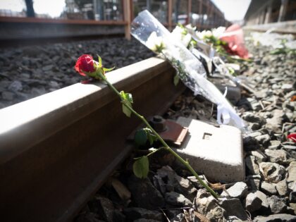 Flowers left by students, laying on the rails of Larissa train station, the last stop of the passenger train before the fatal crashin Larissa, Greece, on March 03,2023. (Photo by Thanasis Elmazis/NurPhoto via Getty Images)