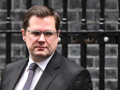 Britain's Minister of State for Immigration Robert Jenrick leaves 10 Downing Street in cen