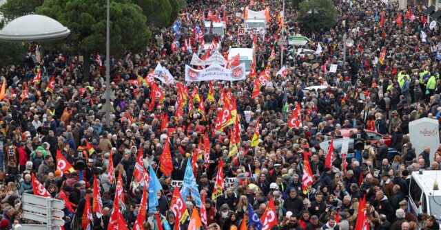 Pics: Mass Protests Against Macron's Pension Plans Break Out in France