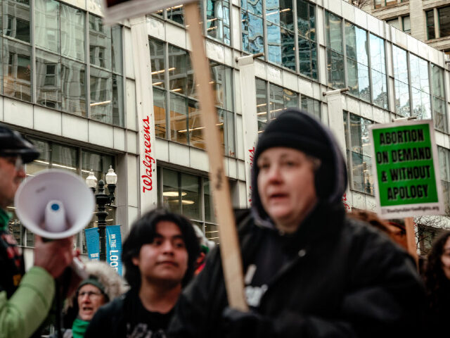 Demonstrators during a protest against Walgreens on International Women's Day in Chicago,