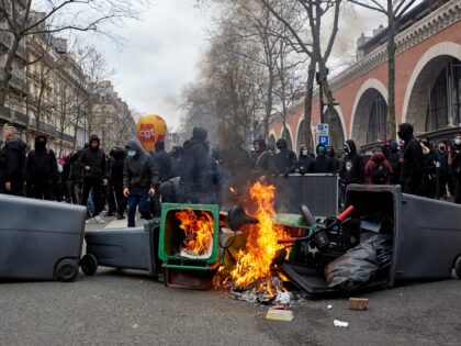 Protestors gathered for a demonstration, as part of a nationwide day of strikes and protests called by unions over the proposed pensions overhaul, in Paris on March 11, 2023. The reform proposed by the government includes the raise of the minimum retirement age from 62 to 64 years and the …