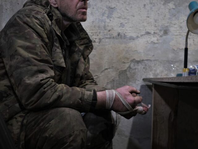 TOPSHOT - A member of the Russian paramilitary group Wagner and former criminal prisoner sits in the interrogation room after being captured by Ukrainian soldiers near Bakhmut, Donetsk region, on March 12, 2023, amid the Russian invasion of Ukraine. (Photo by Sergey SHESTAK / AFP) (Photo by SERGEY SHESTAK/AFP via …