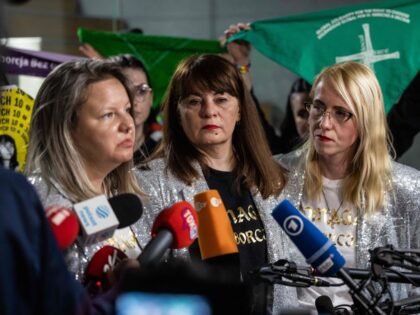 Polish activist Justyna Wydrzynska talks to the press after being found guilty of giving abortion assistance in district court in Warsaw, March 14, 2023. - Polish activist Justyna Wydrzynska was found guilty of supplying a pregnant woman with abortion pills in the Catholic country, her NGO said, in Poland's first …