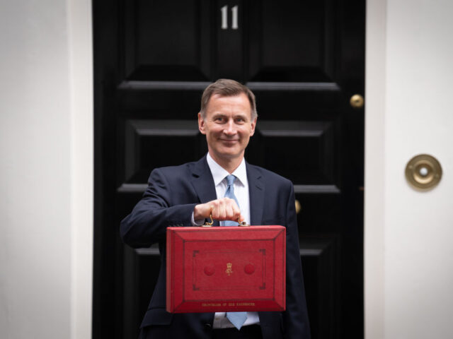 Chancellor of the Exchequer Jeremy Hunt leaves 11 Downing Street, London, with his ministe