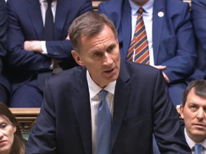 Chancellor of the Exchequer Jeremy Hunt delivering his Budget to the House of Commons in L