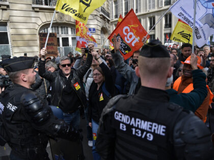PARIS, FRANCE - March 16: Protesters participate in a demonstration against French government's plan to raise the legal retirement age in front of the National Assembly in Paris, on March 16, 2023. (Photo by Firas Abdullah/Anadolu Agency via Getty Images)