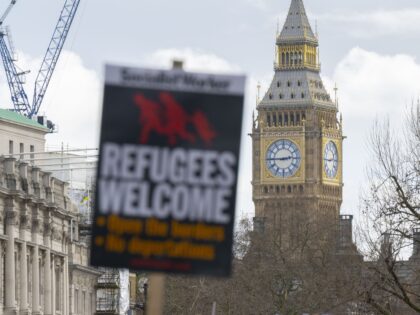 LONDON, UNITED KINGDOM - MARCH 18: Pro-migrant protesters gather in the Portland Place Str