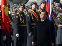 China's President Xi Jinping walks past honour guards during a welcoming ceremony at Moscow's Vnukovo airport on March 20, 2023. - Chinese leader arrived in Moscow on Monday saying his first state visit to Russia since the Ukraine conflict broke out would give "new momentum" to bilateral ties. (Photo by …